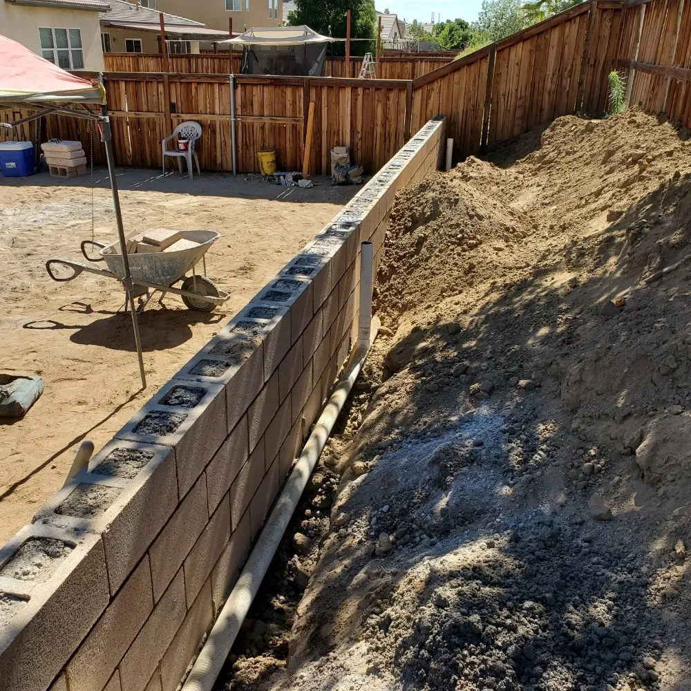 Trusted lawn mowing service for beautiful yards in Victorville, CA by Tropical Construction