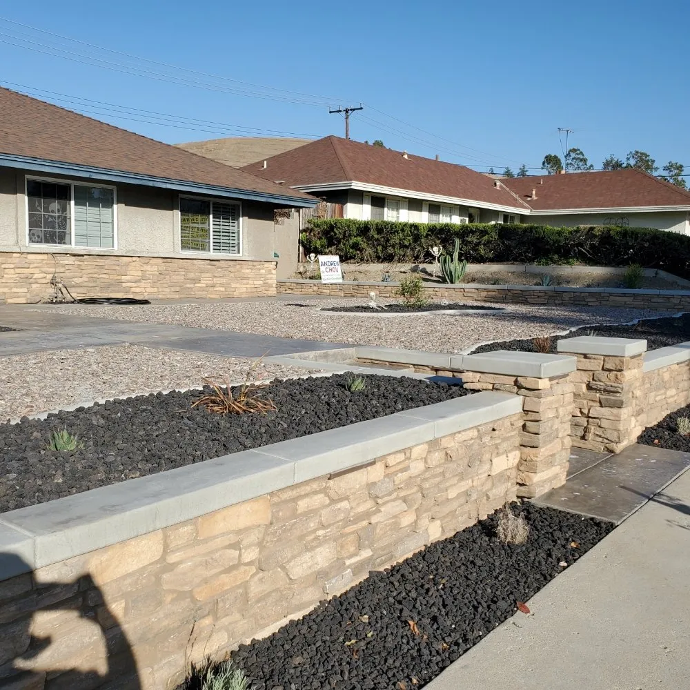 Custom landscape design for year-round maintenance in Victorville, CA by Tropical Construction
