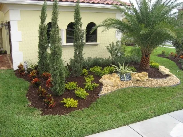 Expert lawn mowing service for year-round maintenance across Kissimmee, FL - Tropical Landscape - Lawn Care