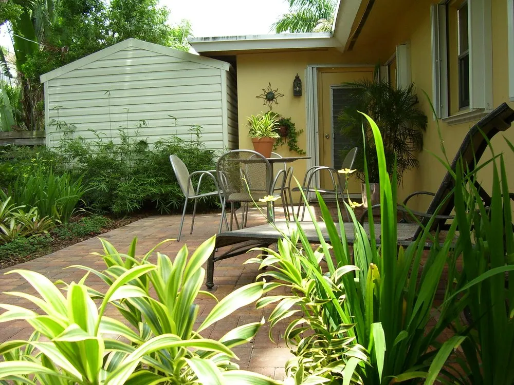 Custom yard maintenance for beautiful yards in Cooper City, FL by Tropical View Landscape