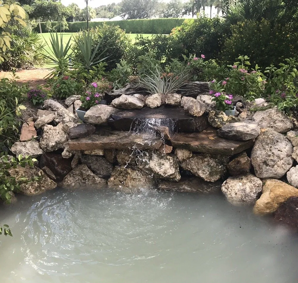 Local lawn care service experts serving Boynton Beach, FL - Tropical Waterfalls & Ponds