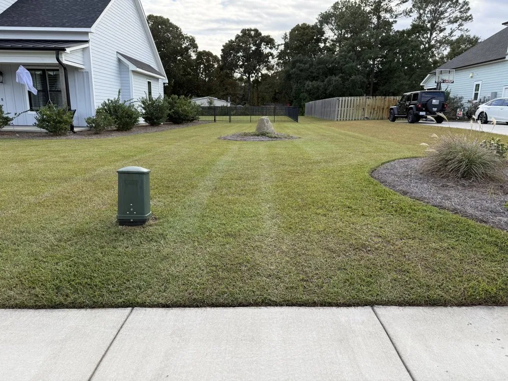 Professional landscape installation in Hampstead, NC by Trout Lawn & Landscape