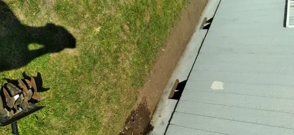 Troys Lawn & Maintence Logo