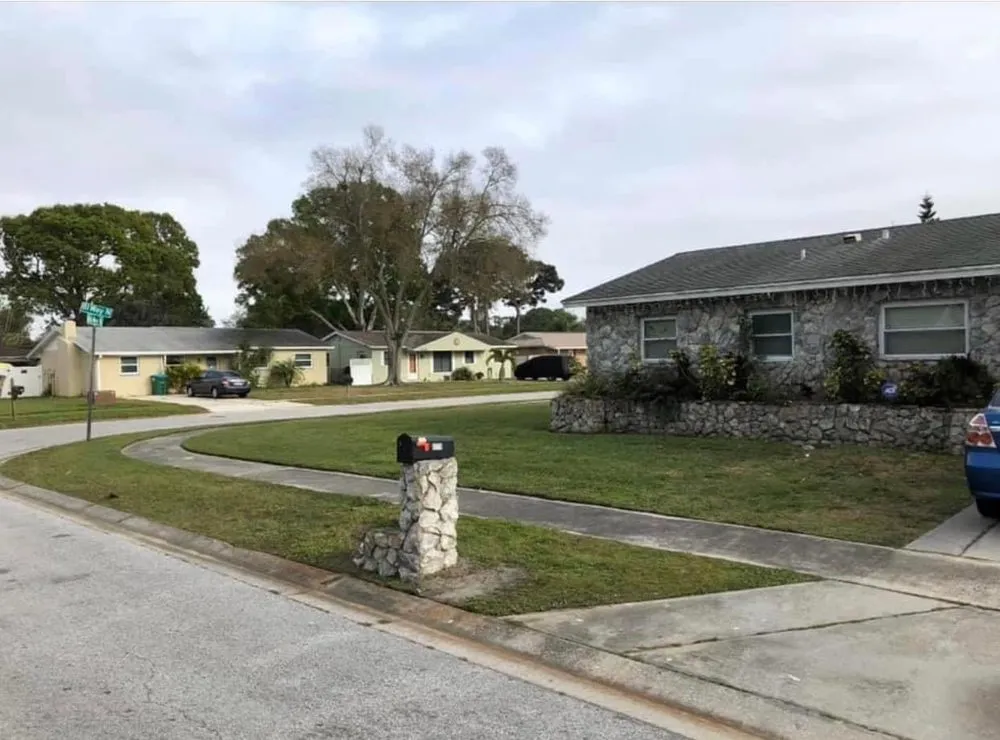 Top-rated yard cleanup service with custom design in New Port Richey, FL by Tru Cutting Lawn Care and Trees