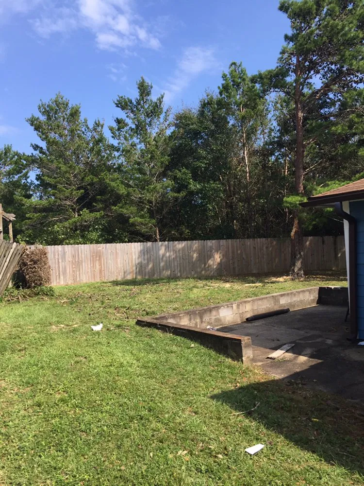 Reliable yard cleanup service for year-round maintenance in Jay, FL by Tru-Trim Outdoor Services