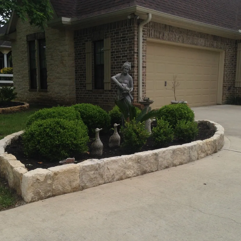 Custom outdoor landscaping for homes in Conroe, TX by True Dreams Lawn Service