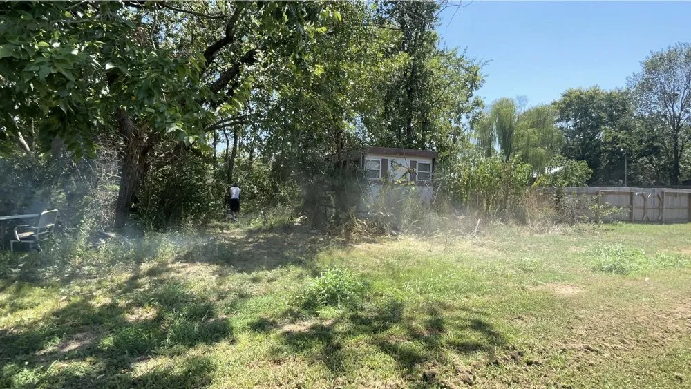 Affordable yard cleanup service for residential properties across McAlester, OK - True Grit Lawn Care