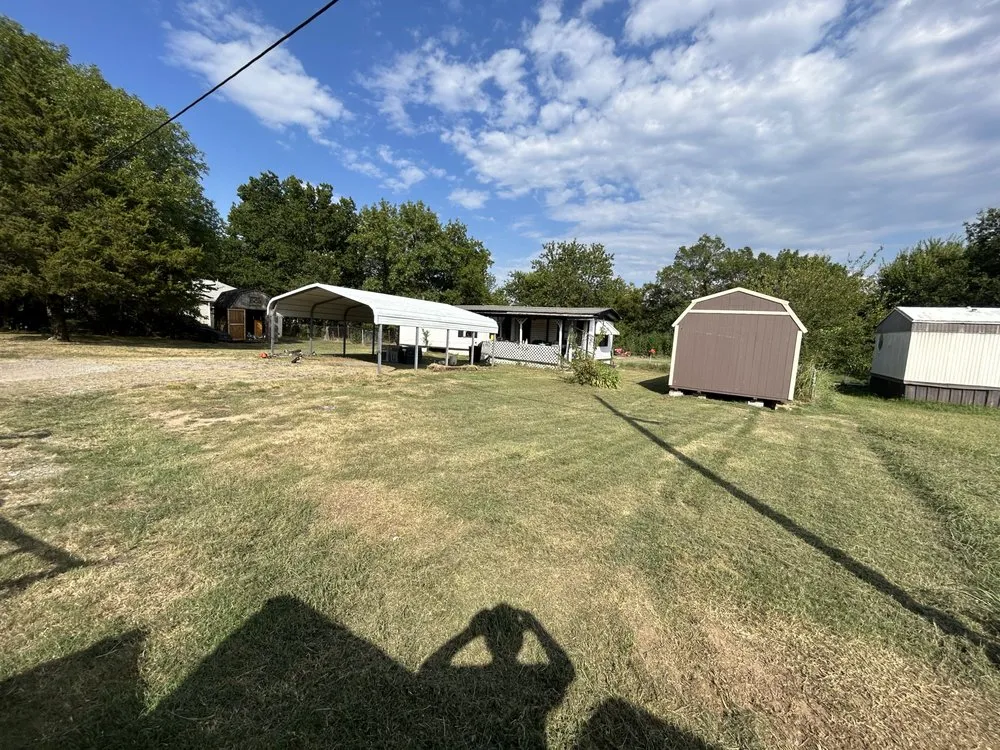 Trusted residential landscaping for beautiful yards in McAlester, OK by True Grit Lawn Care