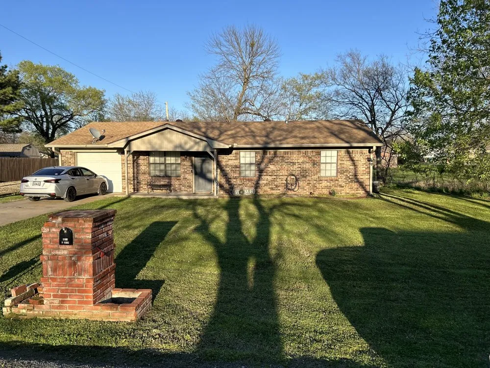 Expert outdoor landscaping with custom design across McAlester, OK - True Grit Lawn Care