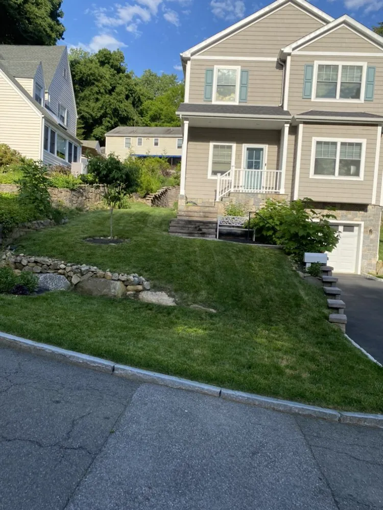 Affordable lawn mowing service with custom design in North White Plains, NY by True Heart Construction And Project Management
