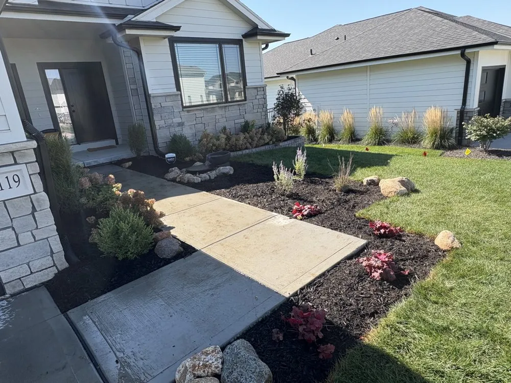 Expert yard maintenance in Omaha, NE by True Heights Landscaping