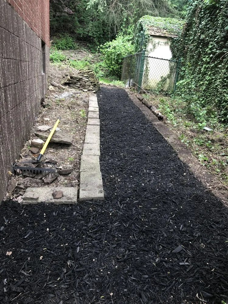 Custom garden landscaping with custom design across Natrona Heights, PA - True Quality Management