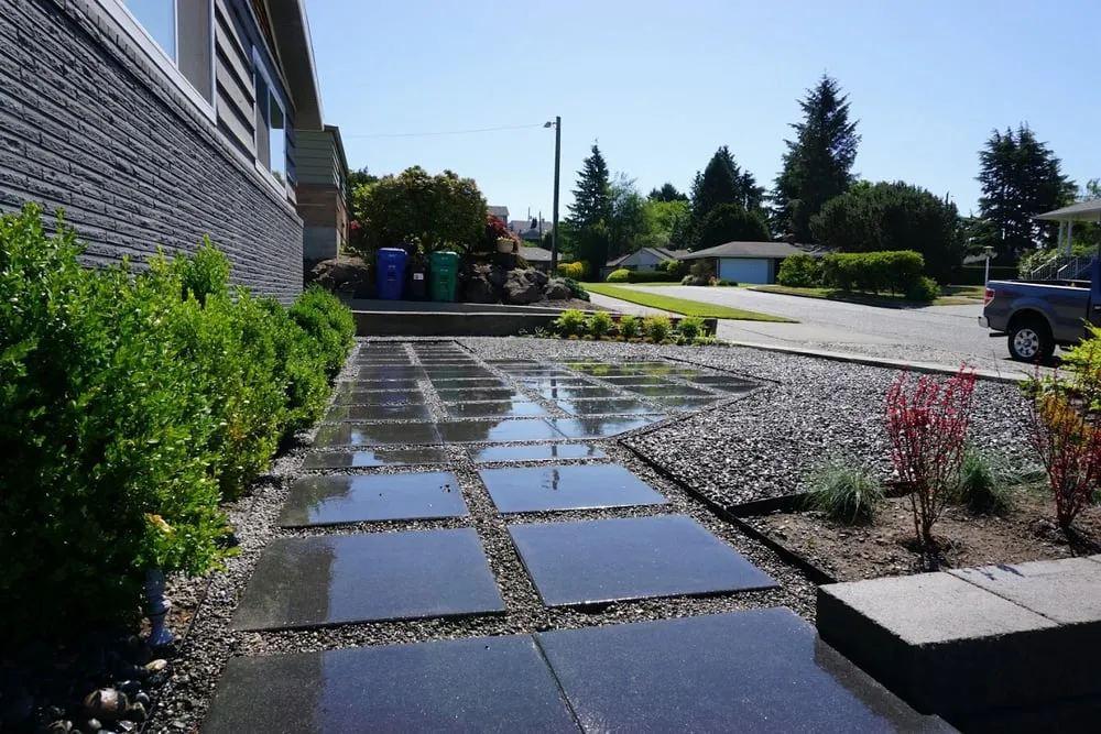 Custom lawn mowing service for year-round maintenance in Seattle, WA by True Scape Design
