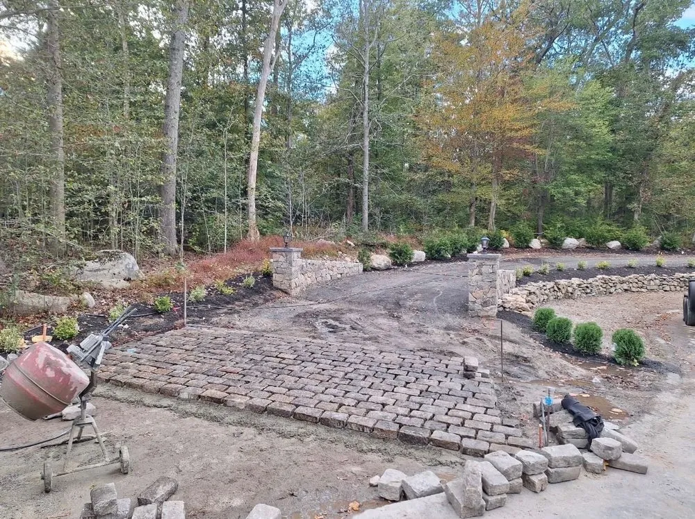 Affordable lawn care service for outdoor upgrades in Woonsocket, RI by TruePath Junk Removal & Landscaping