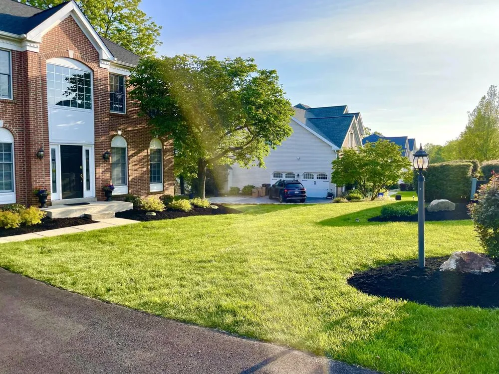 Professional yard maintenance for residential properties in Downingtown, PA by Trust Landscaping