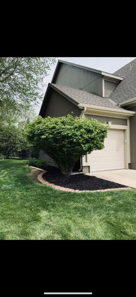 Affordable lawn mowing service with custom design in Mission, KS by Trust Lawn Care