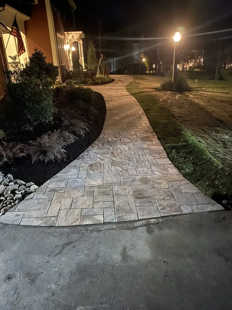 Top-rated lawn mowing service with custom design in Auburn, MA by Trustscaping