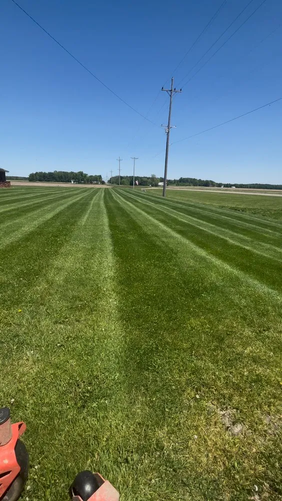 Custom landscape design for residential properties in Center Point, IN by Tryons Mowing Services