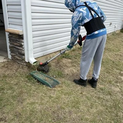 T&S Affordable Lawn Care Logo