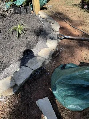 T’s Lawn And Landscaping Logo