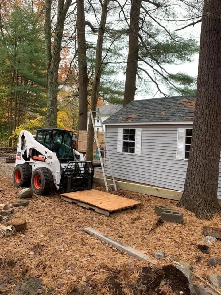 Expert outdoor landscaping for year-round maintenance in Uxbridge, MA by T'S Lawn Care & Stump Grinding
