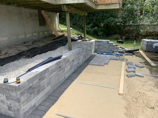 T'S Lawn Care & Stump Grinding Logo