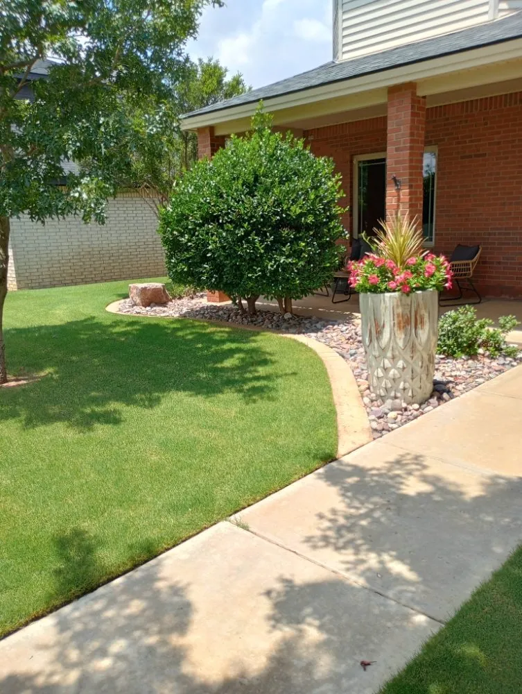 Affordable landscape design in Lubbock, TX by T's Tree Trimming and Lawn Care