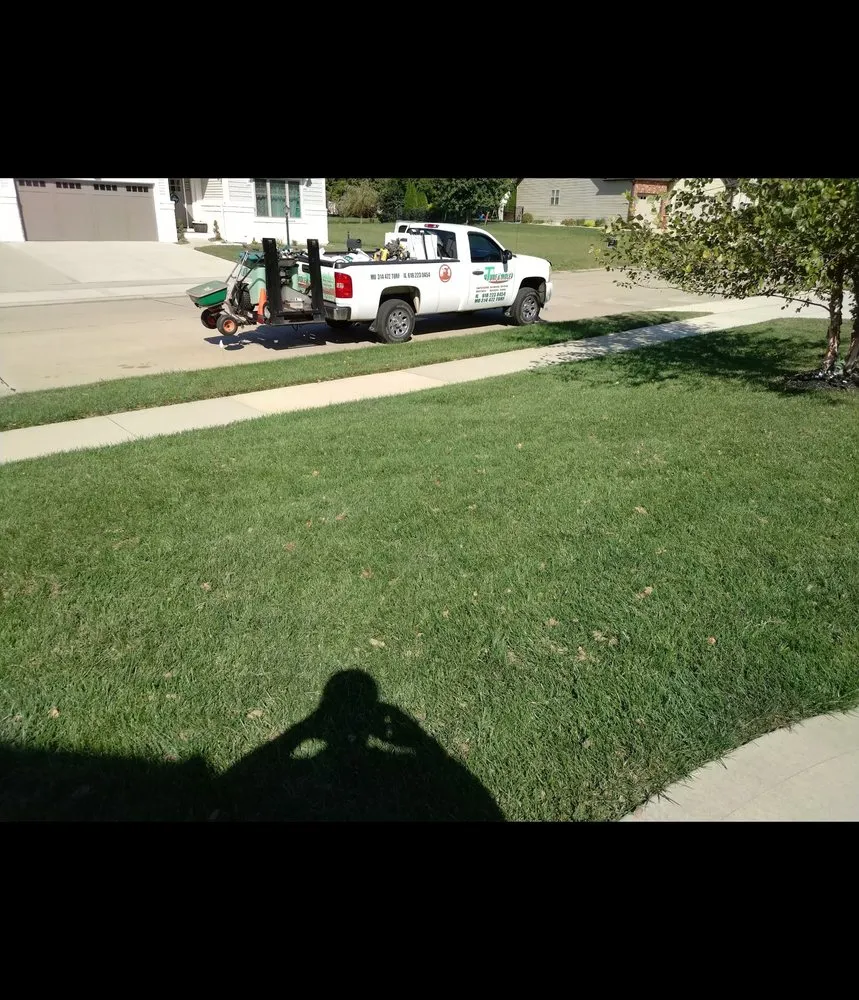 Custom lawn care service for residential properties across Godfrey, IL - T's Turf & Mole