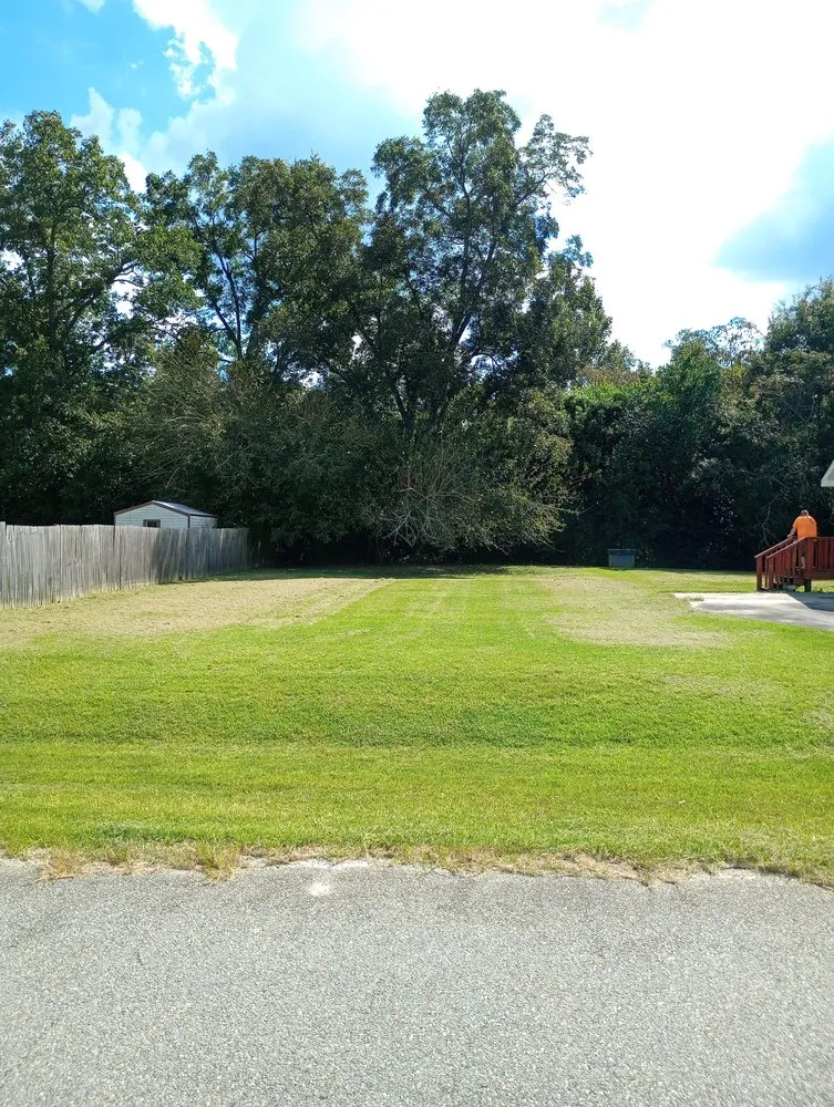 Professional yard maintenance for homes in Fitzgerald, GA by T&T Lawn Service