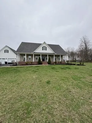 Tubbs Lawn Care Logo