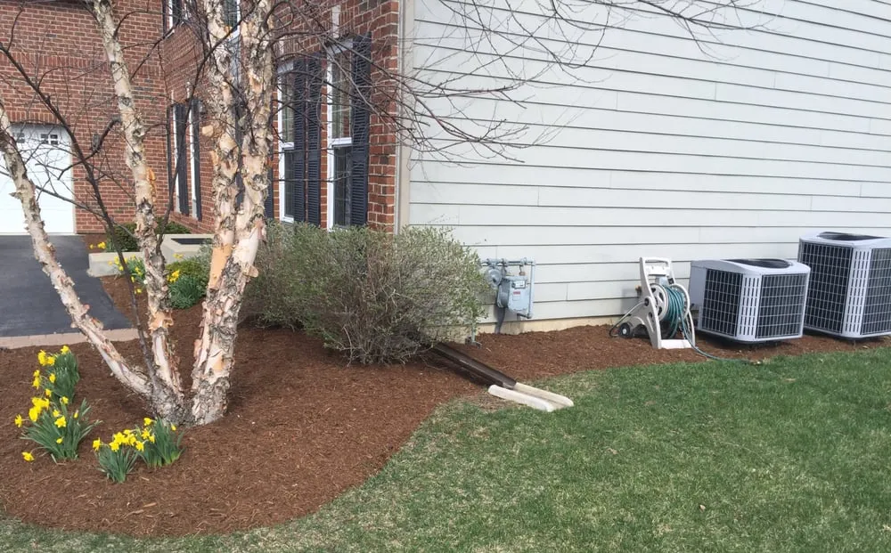 Custom landscape design for residential properties in Elgin, IL by Tully Property Maintenance