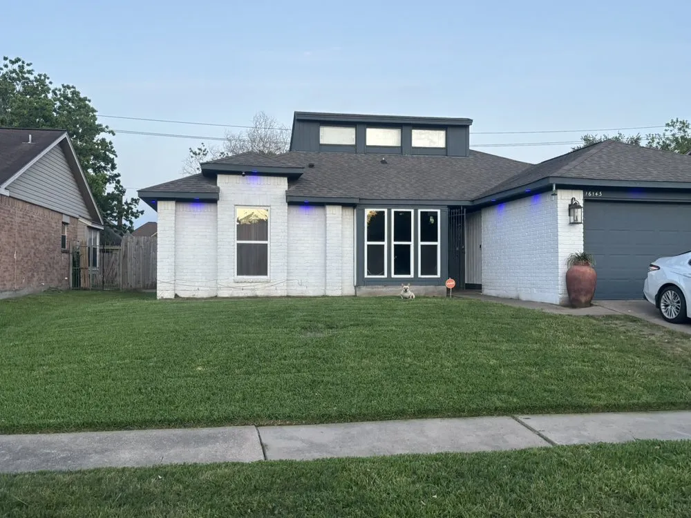 Expert lawn mowing service for homes in Missouri City, TX by Turbo Landscaping