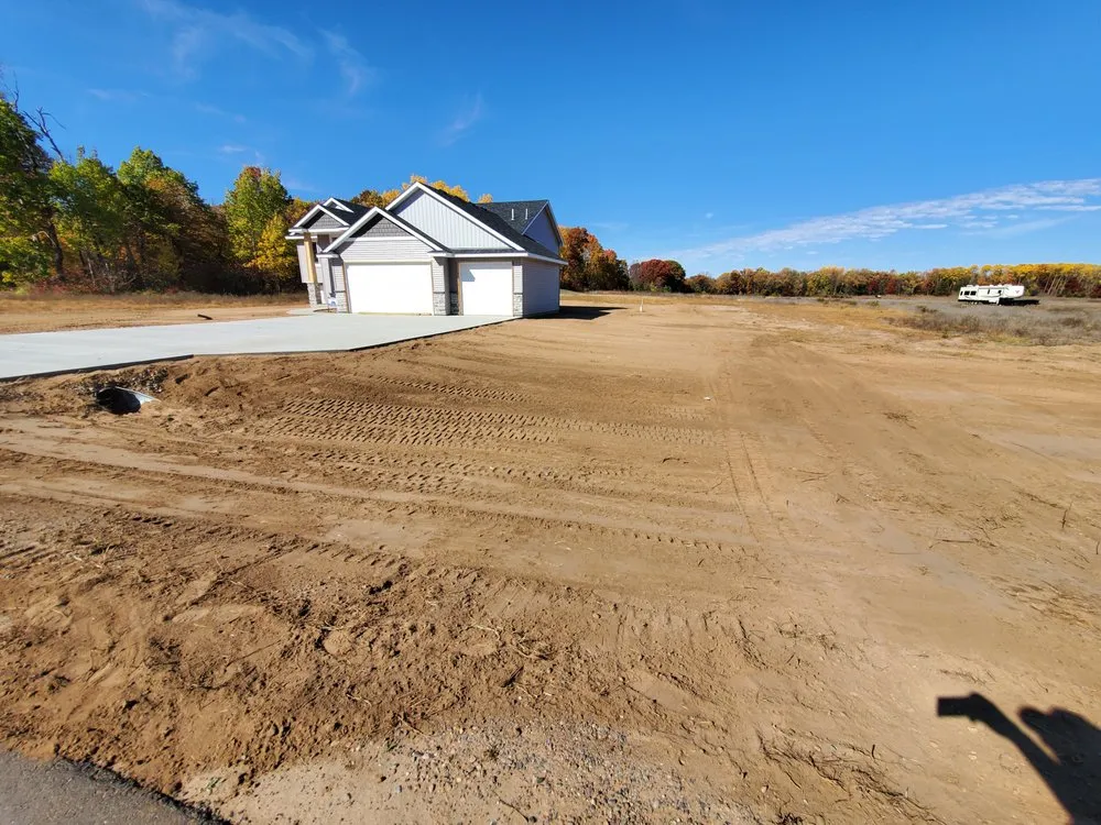 Custom yard cleanup service for year-round maintenance in Elk River, MN by Turf Enterprise Inc.