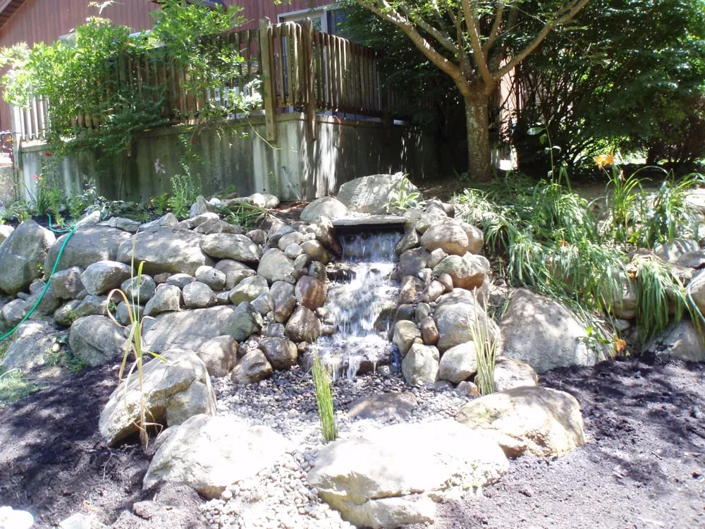 Affordable lawn mowing service in Johnston, RI by Turf Master