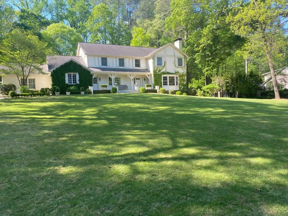 Local lawn mowing service for year-round maintenance in Woodstock, GA by Turf Masters - Woodstock