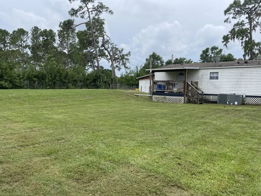 Local lawn mowing service with custom design in Lakeland, FL by Turf Masters Environmental