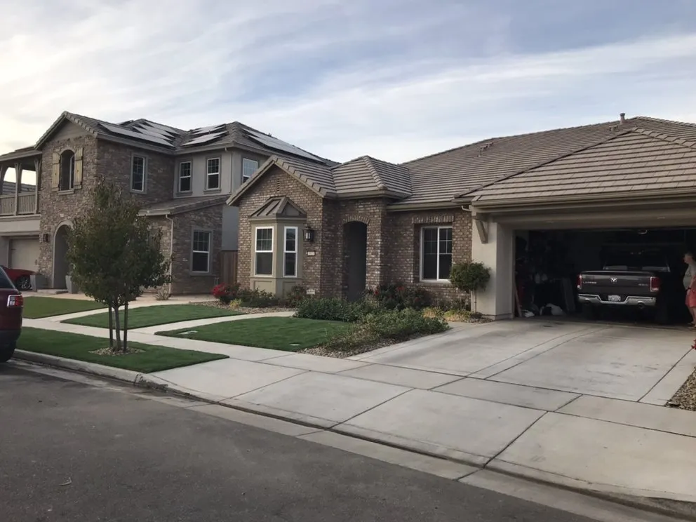 Professional lawn care service for homes in Modesto, CA by Turf Masters Solutions