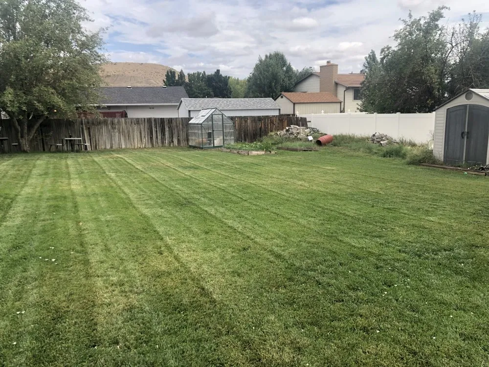 Local garden landscaping with custom design in North Logan, UT by Turffesional Lawn Care & Landscaping
