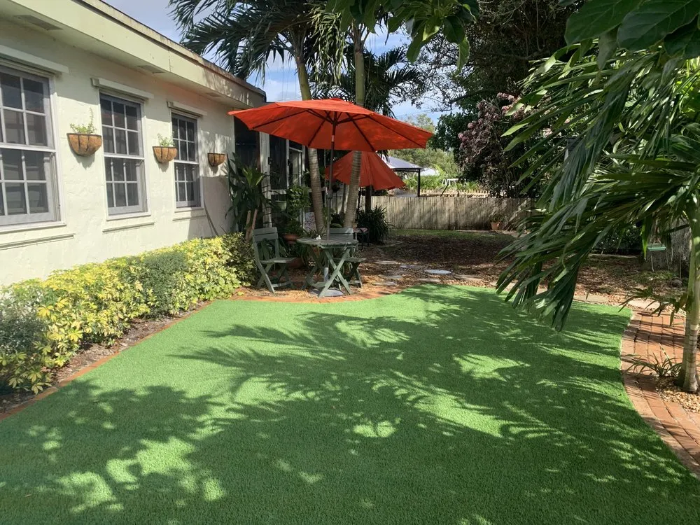 Professional yard cleanup service for year-round maintenance in Pompano Beach, FL by TurfGrass Artificial Solutions