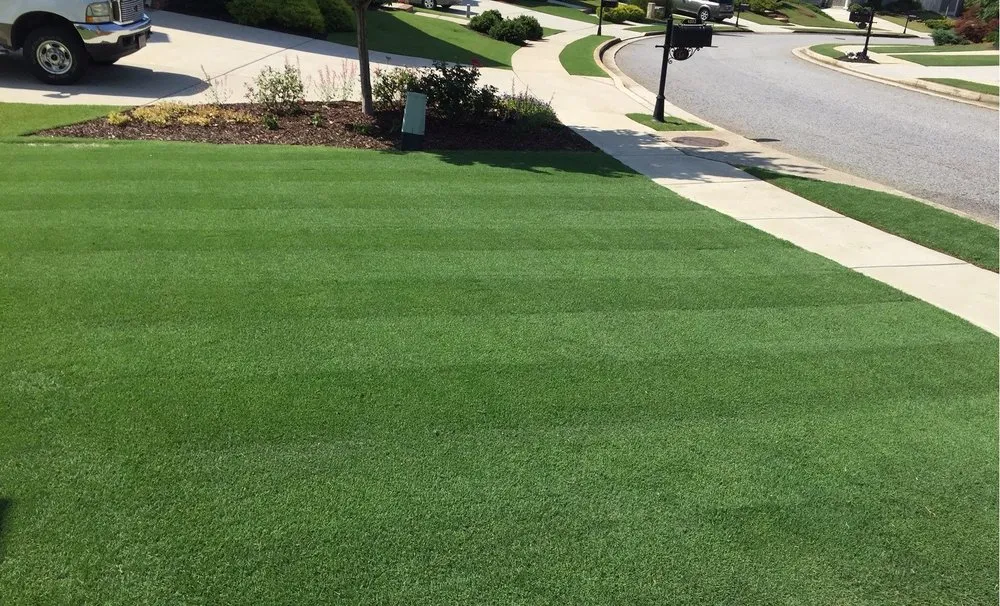 Local lawn mowing service for residential properties in Flowery Branch, GA by TurfMark Outdoor Solutions