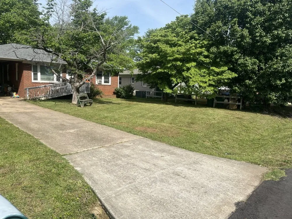 Custom lawn mowing service for year-round maintenance in High Point, NC by Turfmunchers Lawn Care Services