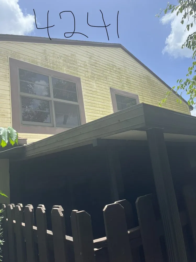 Professional lawn mowing service for homes in Lehigh Acres, FL by Turman's pressure washing and services