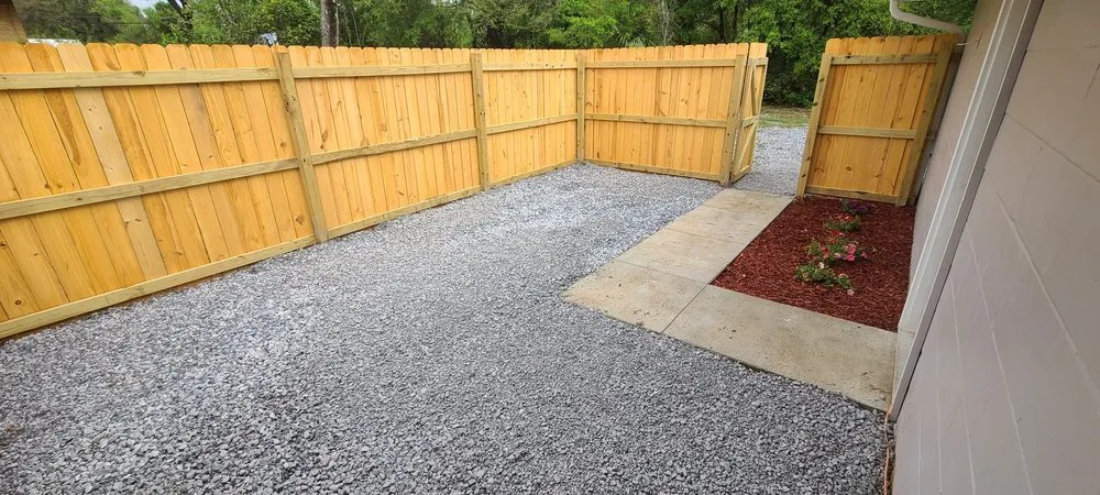 Professional lawn mowing service with custom design in Pensacola, FL by Turn Key Renovations