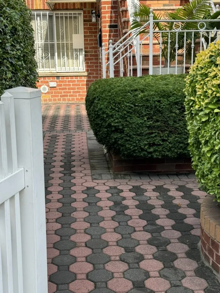 Custom outdoor landscaping with custom design in Brooklyn, NY by Twin Blades