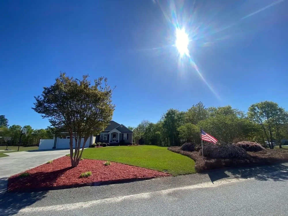 Custom yard cleanup service for beautiful yards in Nashville, NC by Twin Clippers Pro Landscaping