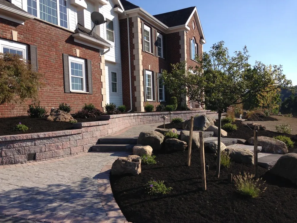 Local outdoor landscaping for year-round maintenance across Macedon, NY - Twin Oaks Lawn & Landscape