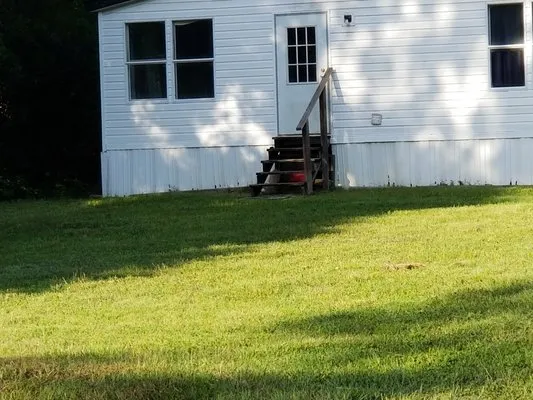 Twin Oaks Lawn Care Logo