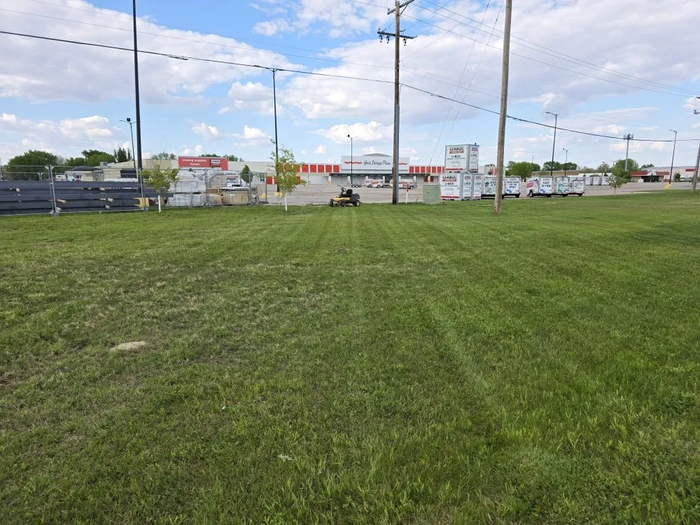 Reliable lawn mowing service for homes in Minot, ND by Twin Oaks Property Maintenance