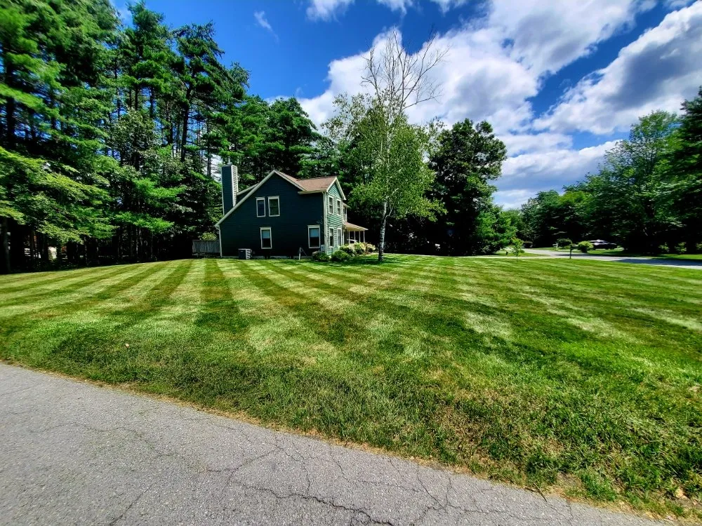 Custom garden landscaping in Queensbury, NY by Twin Peak Lawn Care