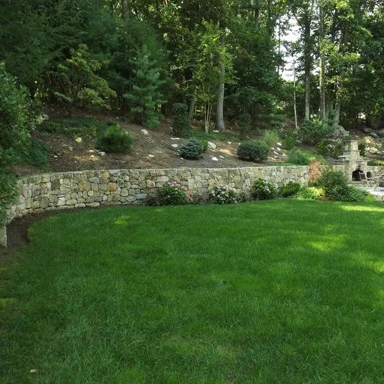 Reliable lawn mowing service for outdoor upgrades in Southborough, MA by Twin Pines Landscaping